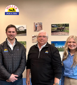 a group of people standing next to each other showcasing miller amish poultry