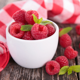 a cup of raspberries