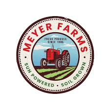 The logo of meyer farms - sun powered - soil grown