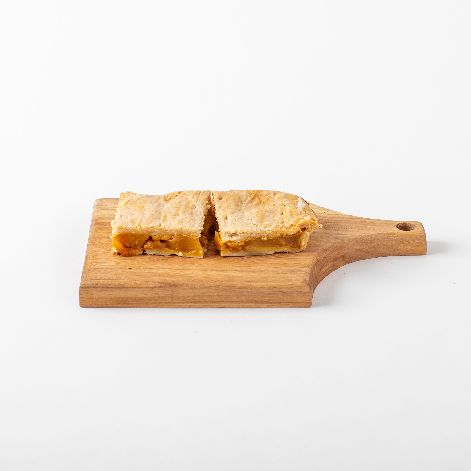 Individual apple and cherry dessert slices.