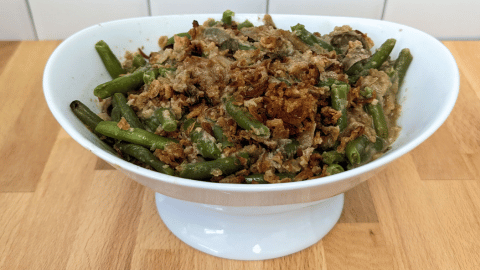 Classic green bean casserole with a crispy onion topping.