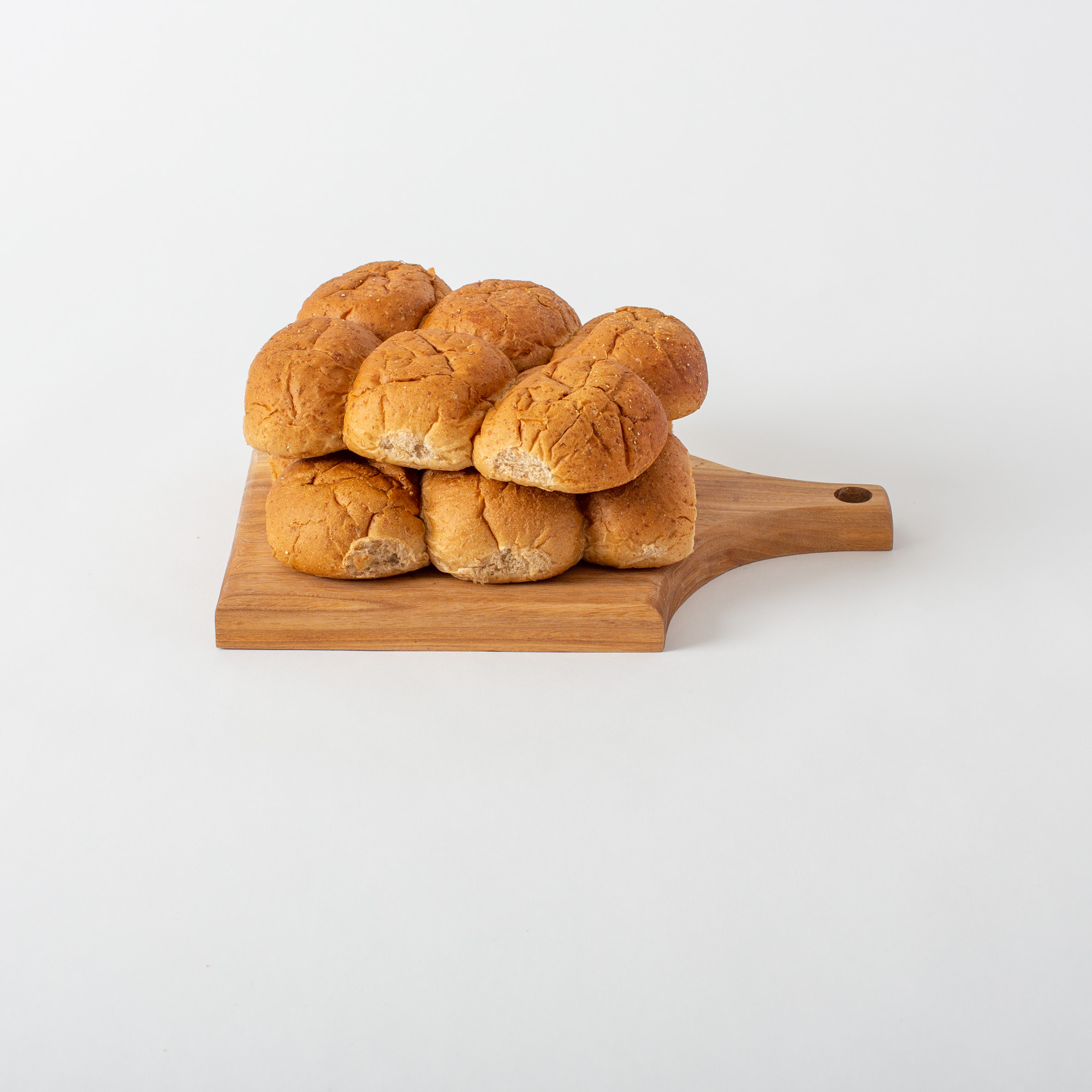 A basket of freshly baked wheat dinner rolls for Thanksgiving.